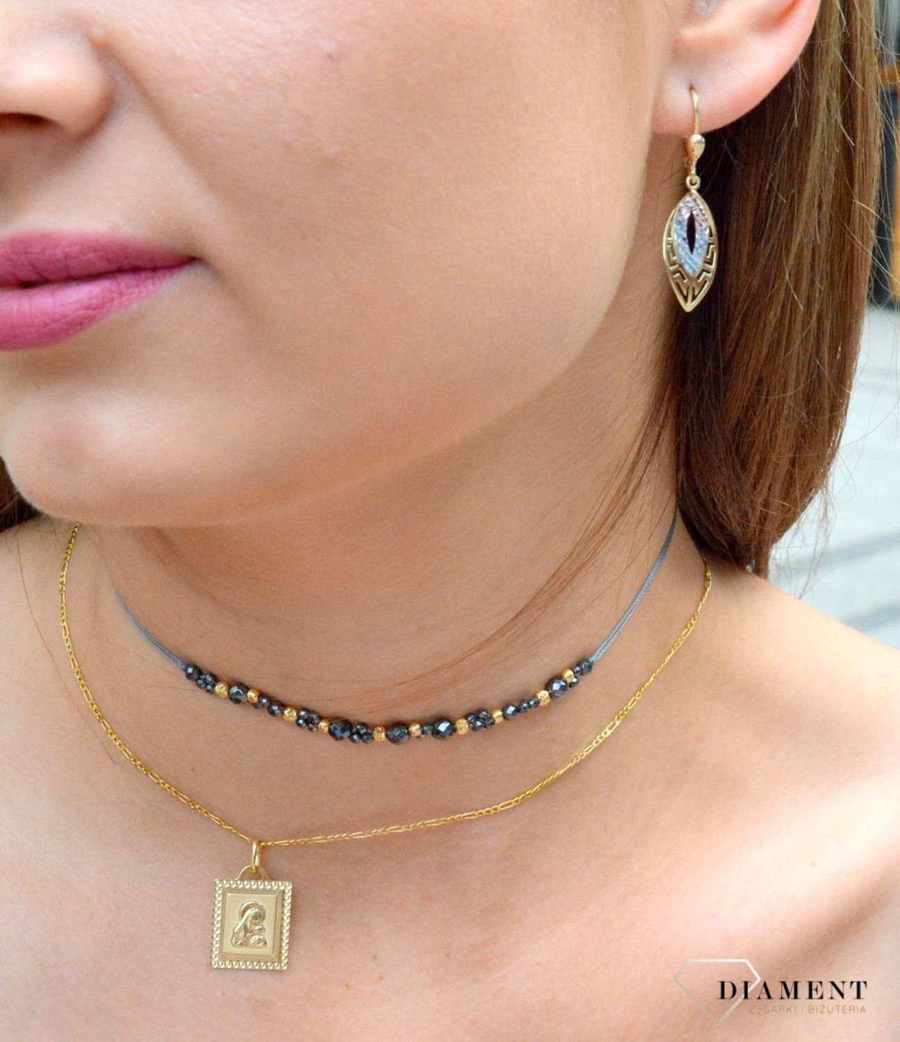 Kolczyki złote pr 333 długie ażurowe z białym złotem KL 5751 333. Od minimalistycznych zdobień po intensywne i nowoczesne formy. Olśniewające kolczyki wykonane z wysokiej jakości 8-karatowego żółtego złota i białego złota, pró.jpg